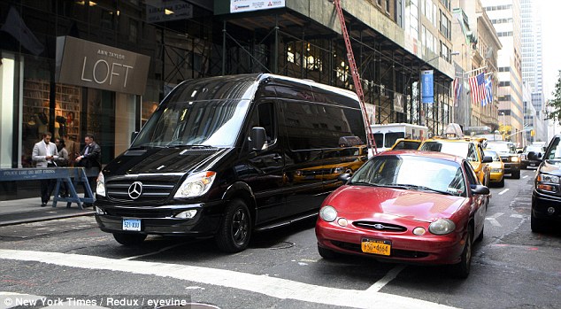 Driving commuters around the Benz: New York City's wealthiest enjoy hidden luxury in Mercedes vans that take up half the road Driving commuters around the Benz: New York City's wealthiest enjoy hidden luxury in Mercedes vans that take up half the road