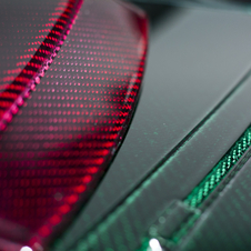 Right now, the colored carbon fiber is only available in red and green