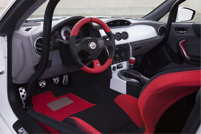 It also has four-point harnesses, a roll cage and racing seats It also has four-point harnesses, a roll cage and racing seats