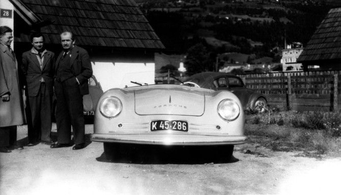 Ferry Porsche (centre), his father Ferdinand Porsche (right) and Erwin Komenda (left), 1948, in front of the 356 No. 1 Ferry Porsche (centre), his father Ferdinand Porsche (right) and Erwin Komenda (left), 1948, in front of the 356 No. 1
