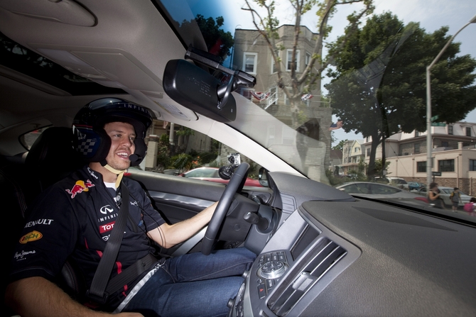 Vettel gave some VIPs passenger laps in the Infiniti Vettel gave some VIPs passenger laps in the Infiniti