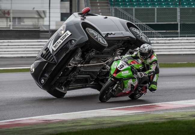 For this year, it completed a stunt where a superbike passed a Mito while the car was on two wheels For this year, it completed a stunt where a superbike passed a Mito while the car was on two wheels