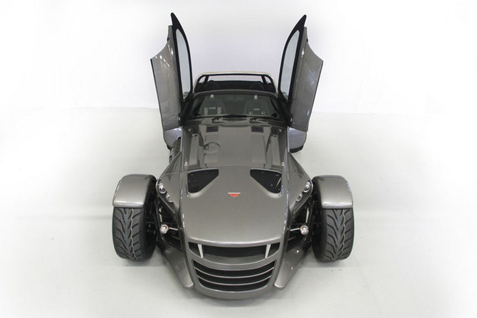 The car seats two and has two doors The car seats two and has two doors