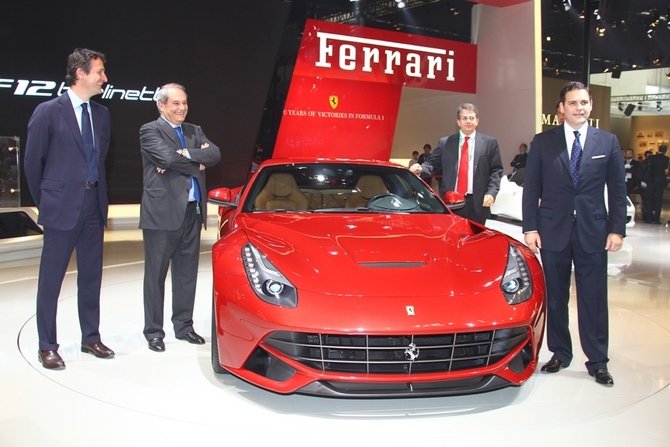 Ferrari executives were on hand in China to pose with the car Ferrari executives were on hand in China to pose with the car