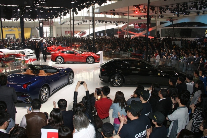 Ferrari had its entire lineup on hand, and they drew a huge crowd. Keep in mind this is press day; the general public is not allowed in. Ferrari had its entire lineup on hand, and they drew a huge crowd. Keep in mind this is press day; the general public is not allowed in.
