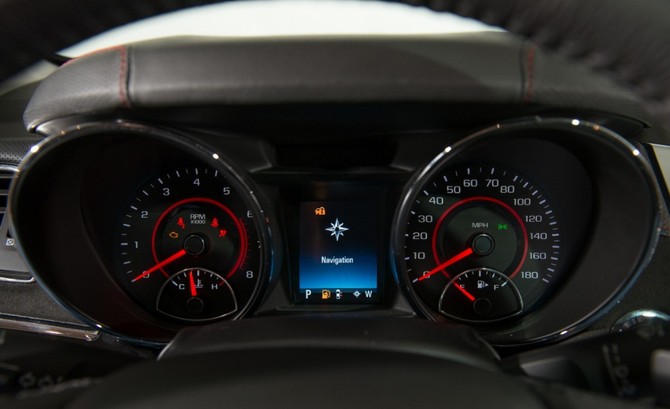 The interior comes with many standard performance features like a color heads-up display The interior comes with many standard performance features like a color heads-up display