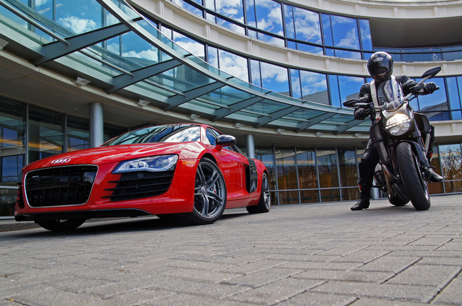 The image shows and Audi R8 and Ducati Diavel outside what appears to be the Audi headquarters The image shows and Audi R8 and Ducati Diavel outside what appears to be the Audi headquarters