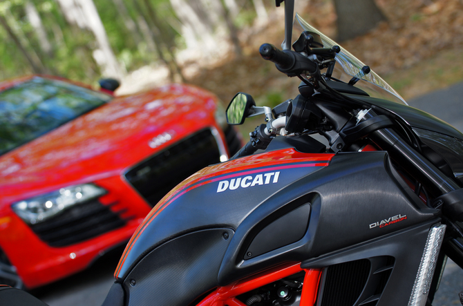 This image shows the Diavel more prominently with the R8 in the background This image shows the Diavel more prominently with the R8 in the background