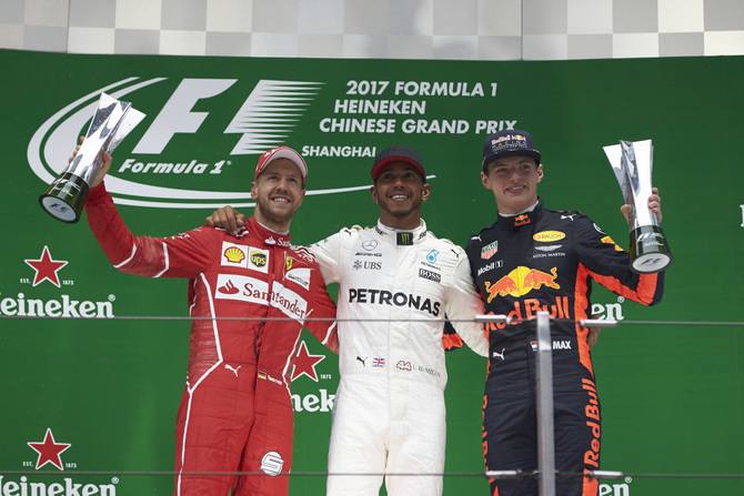 Sebastian Vettel and Max Verstappen were alongside Hamilton on the podium of the Chinsese Grand Prix Sebastian Vettel and Max Verstappen were alongside Hamilton on the podium of the Chinsese Grand Prix