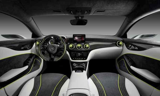 The infotainment screen looks tacked on and the neon green piping is too much The infotainment screen looks tacked on and the neon green piping is too much