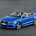 It is identical to the standard car other than its folding cloth top with glass rear window