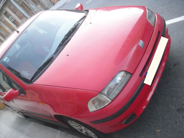 My Fiat Punto, in Ferrari red... My Fiat Punto, in Ferrari red...