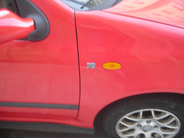 My Fiat Punto, in Ferrari red... My Fiat Punto, in Ferrari red...