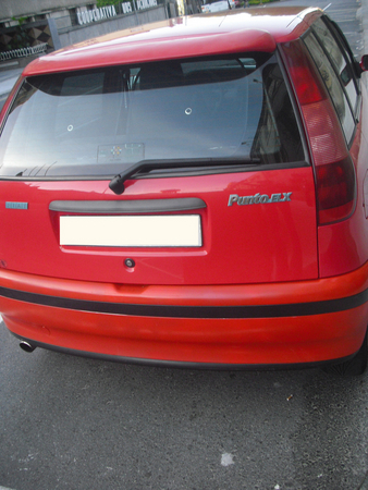 My Fiat Punto, in Ferrari red... My Fiat Punto, in Ferrari red...