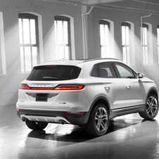 It features a wraparound tailgate with lights that extend its width