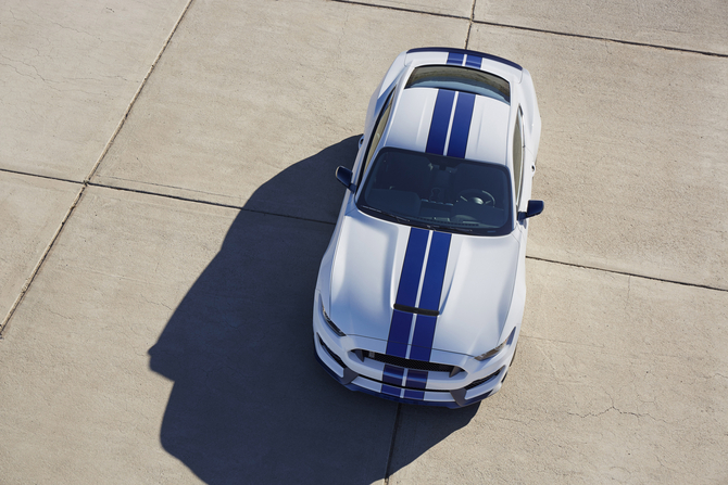 One major change in the GT350 compared to the Mustang is the front hood made of aluminum that surrounds the engine One major change in the GT350 compared to the Mustang is the front hood made of aluminum that surrounds the engine