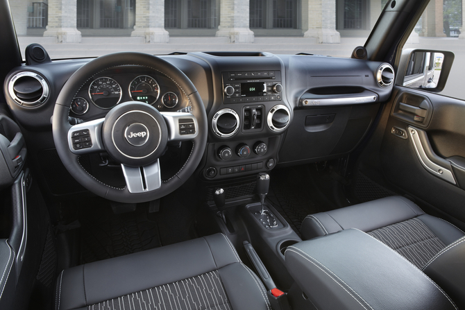 The interior gets an aluminum and leather steering wheel, black cloth seats and aluminum trim The interior gets an aluminum and leather steering wheel, black cloth seats and aluminum trim