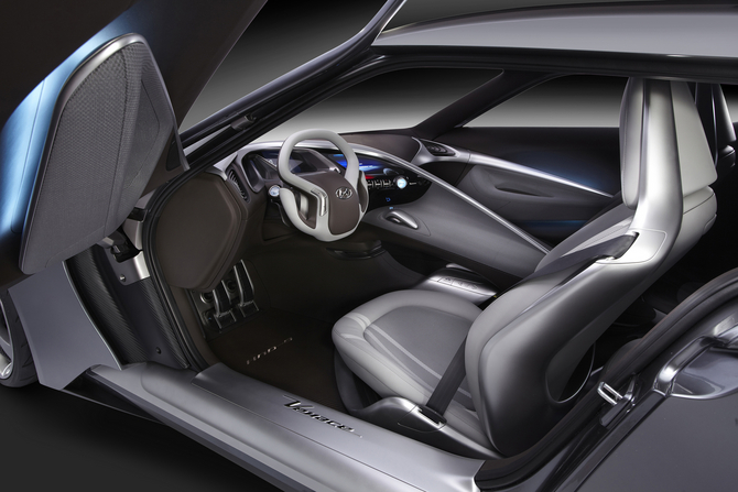 The interior is quite different from the exterior with less minimalist styling The interior is quite different from the exterior with less minimalist styling