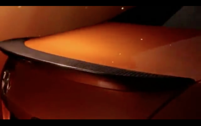 The car has some carbon fiber pieces as well The car has some carbon fiber pieces as well