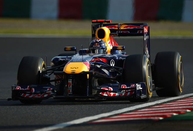 Vettel takes pole and closes on title Vettel takes pole and closes on title