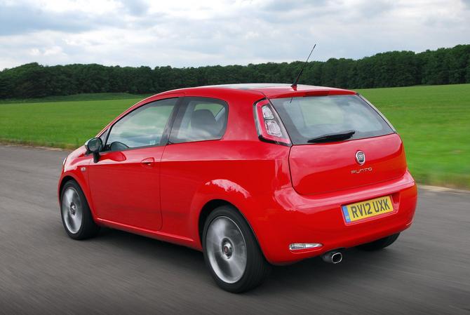 The Fiat badge is the door look that opens when you push it The Fiat badge is the door look that opens when you push it