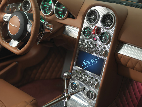The B6 has Spyker's well known touches like the exposed gearshift and metal toggle switches The B6 has Spyker's well known touches like the exposed gearshift and metal toggle switches