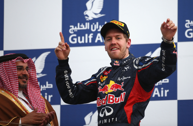 Vettel celebrating on the podium Vettel celebrating on the podium