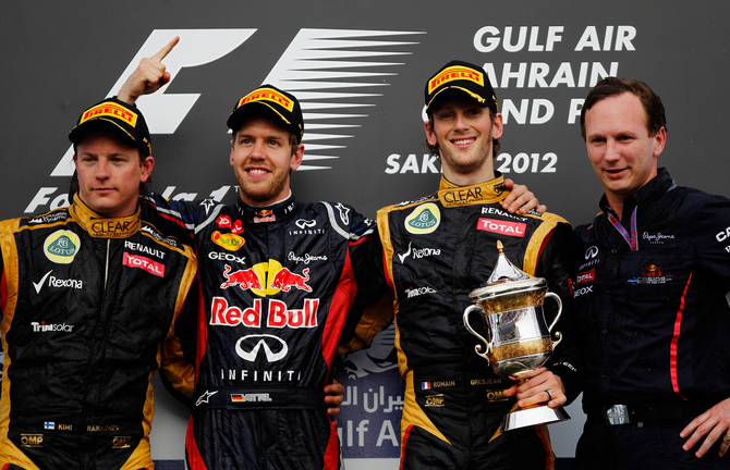 Vettel ao lado de Raikkonen e Romain Grosjean Vettel ao lado de Raikkonen e Romain Grosjean
