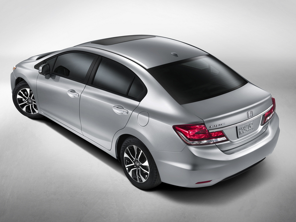 The rear includes tail lights blended into the trunk The rear includes tail lights blended into the trunk