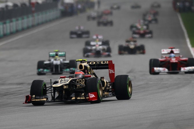 Romain Grosjean at the Malaysian Grand Prix where he qualified 7th but did not finish Romain Grosjean at the Malaysian Grand Prix where he qualified 7th but did not finish