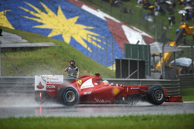 Alonso takes win in wet race in Sepang Alonso takes win in wet race in Sepang
