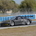 The car is partially carbon fiber with widened fenders in the front and rear