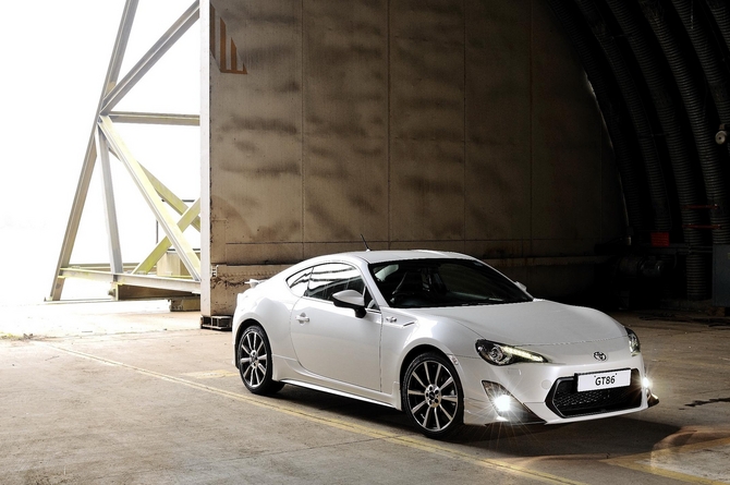 Upgrades include 18-inch alloys, front and side skirts, rear spoiler, fast-response quad exhaust Upgrades include 18-inch alloys, front and side skirts, rear spoiler, fast-response quad exhaust